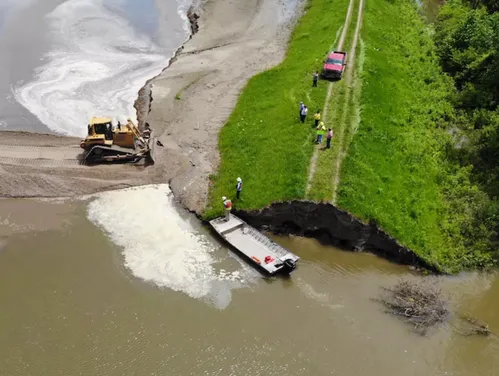 The U.S. Army Corps of Engineers, Omaha District completes an initial breach closure on levee L575 near Percival, IA June 20, 2019.