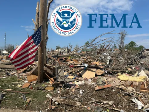 American flag hangs near widespread tornado damage in Greenfield, Iowa. Presidential Major Disaster Declaration for Iowa counties Adair, Polk, Story, and Montgomery.