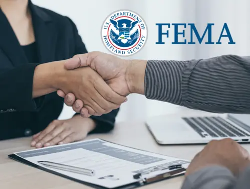 Handshake with FEMA logo