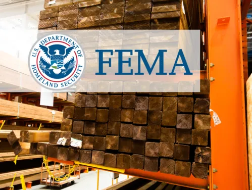 Wood stacked in hardware store, FEMA logo.