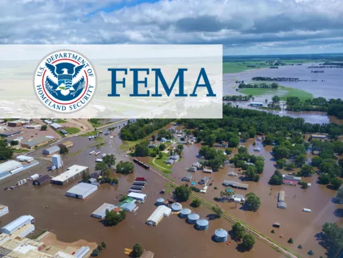 Aerial view of flooding in Iowa and FEMA logo.
