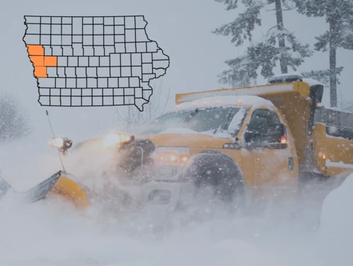 Snow plow moving through heavy snow. State of Iowa map with Crawford, Harrison, Monona, and Woodbury Counties selected.