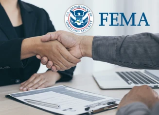 Handshake with FEMA logo