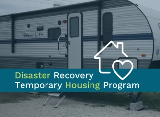 FEMA travel trailer with text: Disaster Recovery Temporary Housing Program
