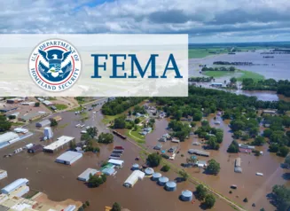 Aerial view of flooding in Iowa and FEMA logo.