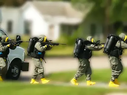 Polk County SWAT Team enters building with guns drawn during exercise.