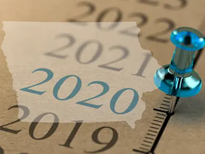 Push pin on timeline of years 2019-2021 with State of Iowa map outline.